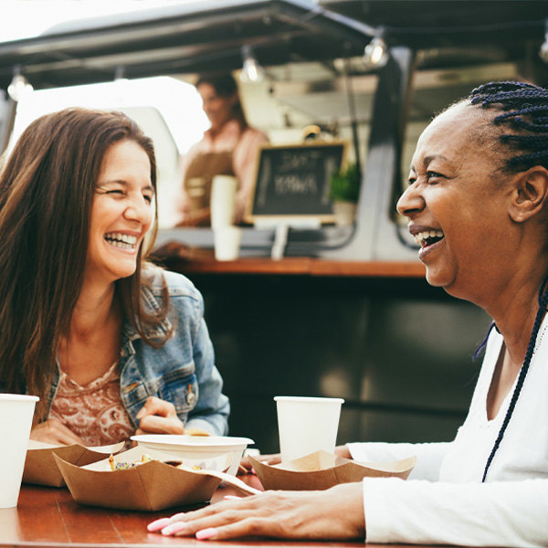 food-truck-pos-configuration-inline women laughing outside of food truck