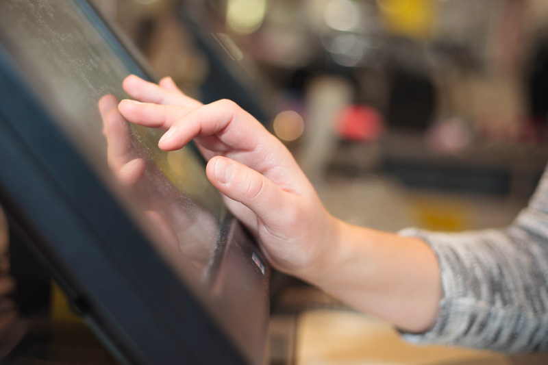 woman using all-in-one pos system